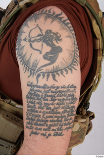 Luis Donovan Contractor A pose arm tattoo 0001.jpg